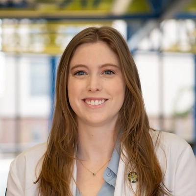 A headshot of Dr. Katherine Hickmanan, an eye doctor of the Mills Vision Care